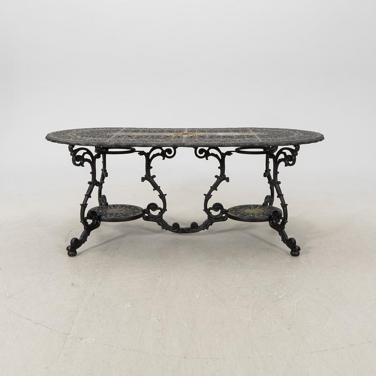 A seven pcs metal garden suit later part of the 20th century.