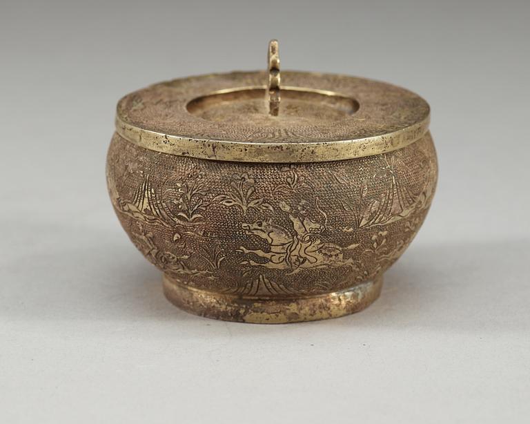 An elegant silver box with cover, presumably Tang dynasty.