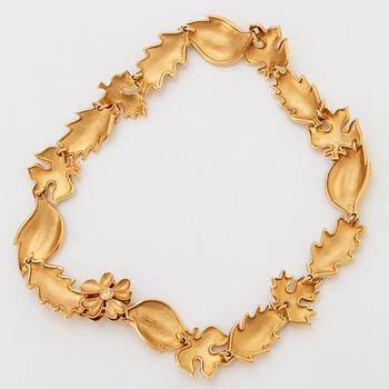 Ole Lynggaard collier 18K guld och en rund briljantslipad diamant.