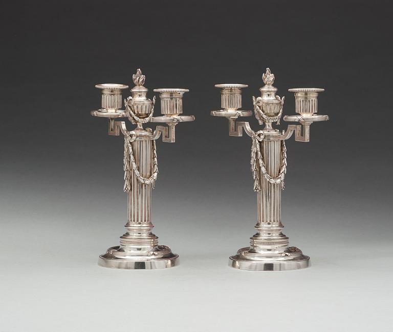 A pair of Fabergé, silver candelabra, workmaster Julius Rappoport, S.t Petersburg before 1899.