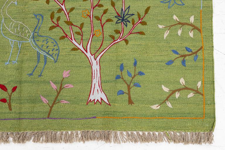 A hand-embroidered Kilim rug, c. 200 x 150 cm.