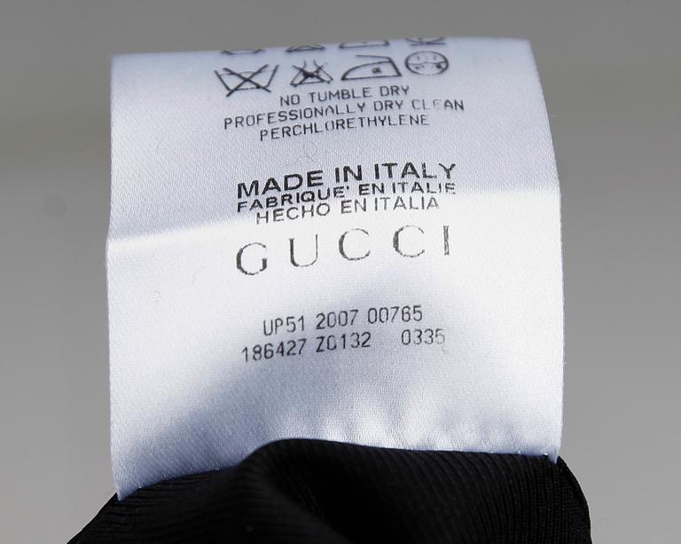 KJOL, Gucci.
