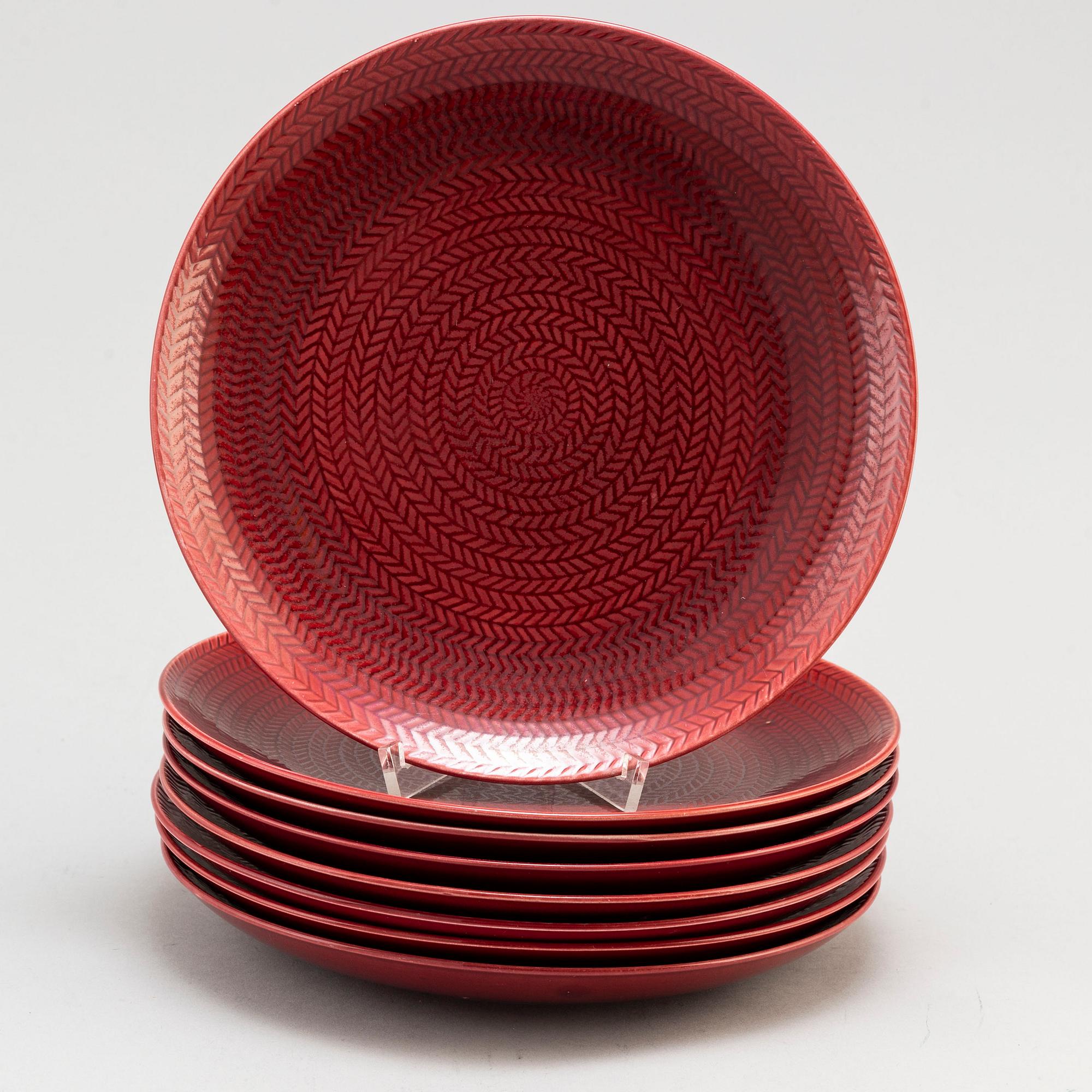 Eight 'Blå eld' plates by Hertha Bengtsson from Rörstrand.