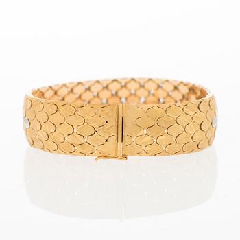 A BRACELET, 18K gold in three colours.