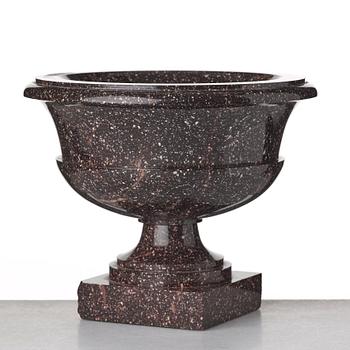 A Swedish porphyry urn, early 19th century.