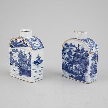 A chinese blue and white porcelain tea pot, two tea caddies, and a dish for a tea pot, Qing Dynasty, Qianlong (1736-95).