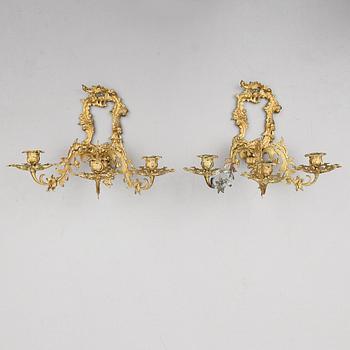 VÄGGLAMPETTER, 1 par, förgylld brons, 1800-talets andra hälft.