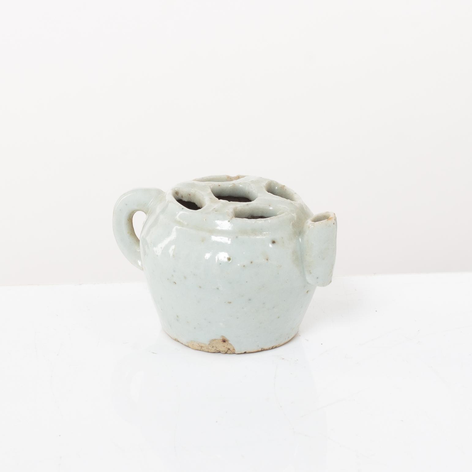 Two joss stick holders, a vase, a brush washer and a small ewer, Qing dynasty, 19th century and older.