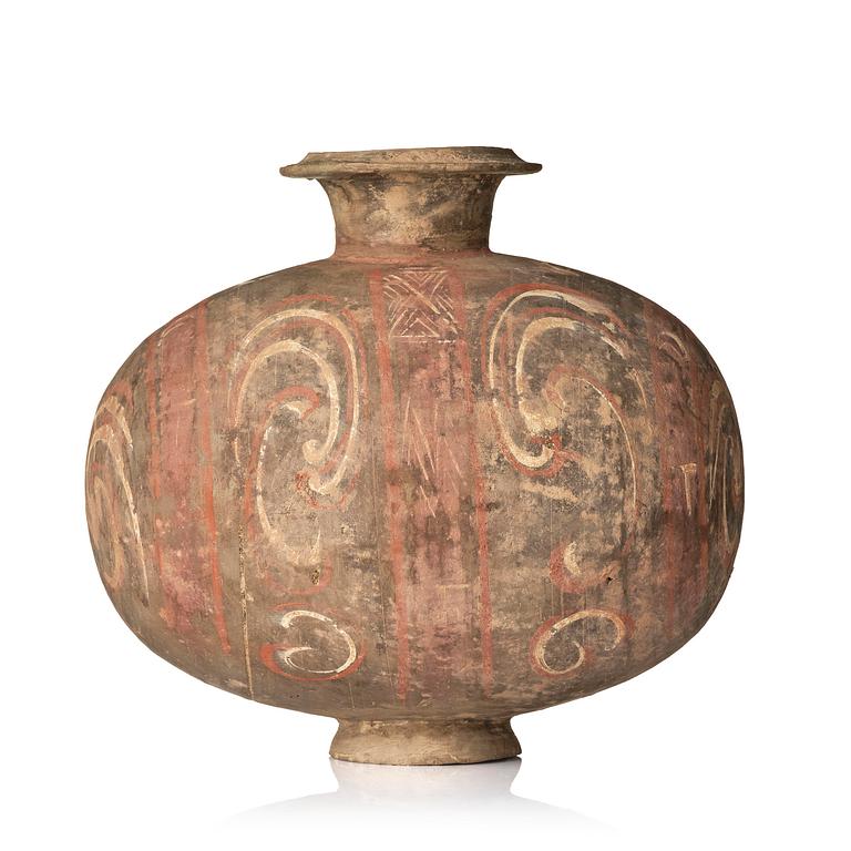 A well-painted dark grey pottery cocoon jar, 
Han dynasty (206 BC-AD 220).