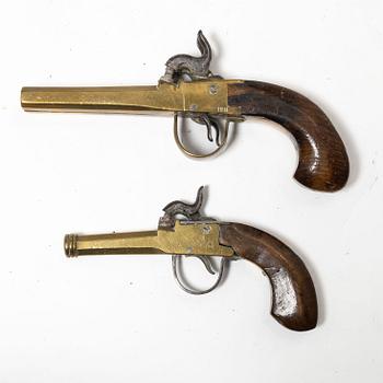 Two percussion pistols, 19th century.