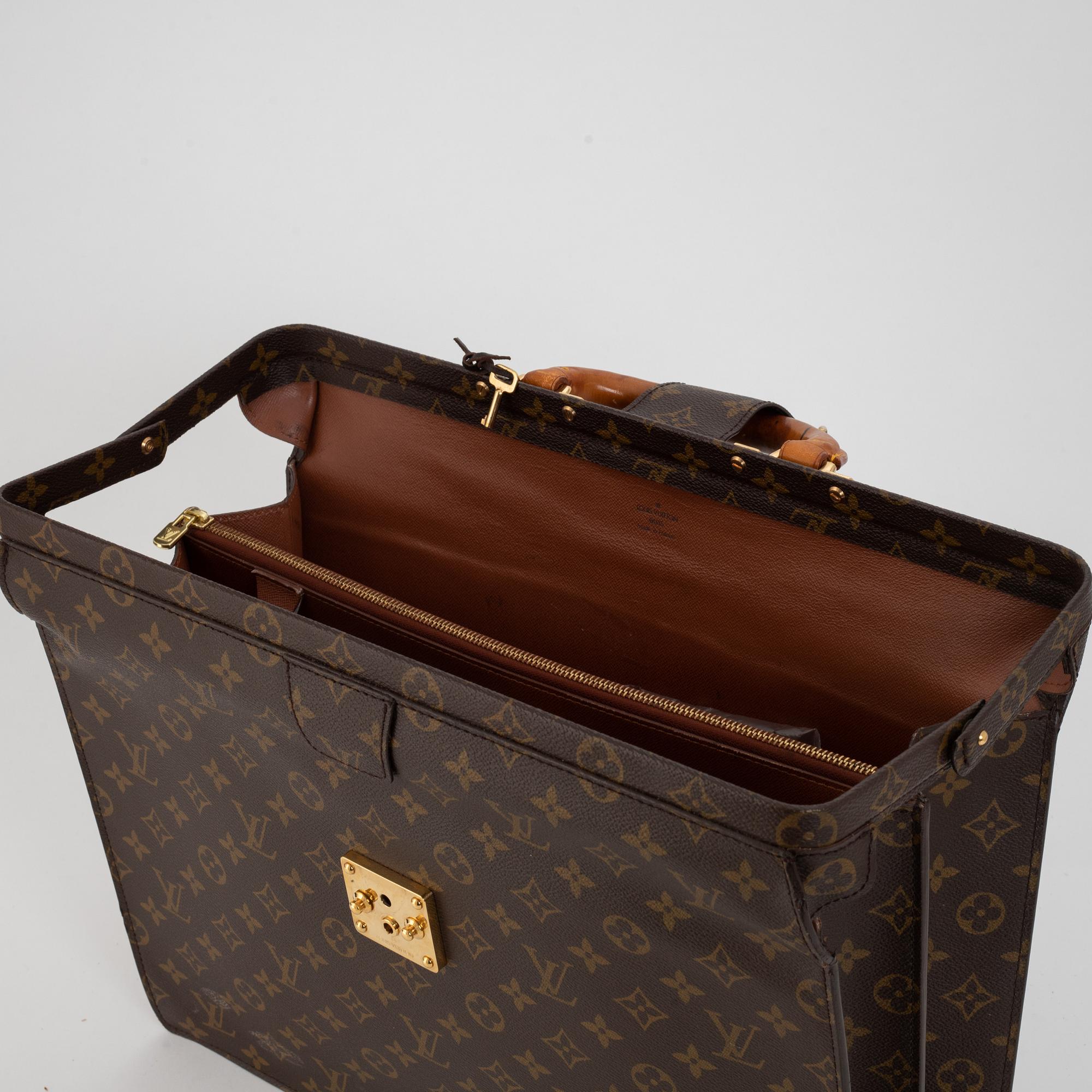 Louis Vuitton, a monogram canvas 'Serviette Fermoir' briefcase.