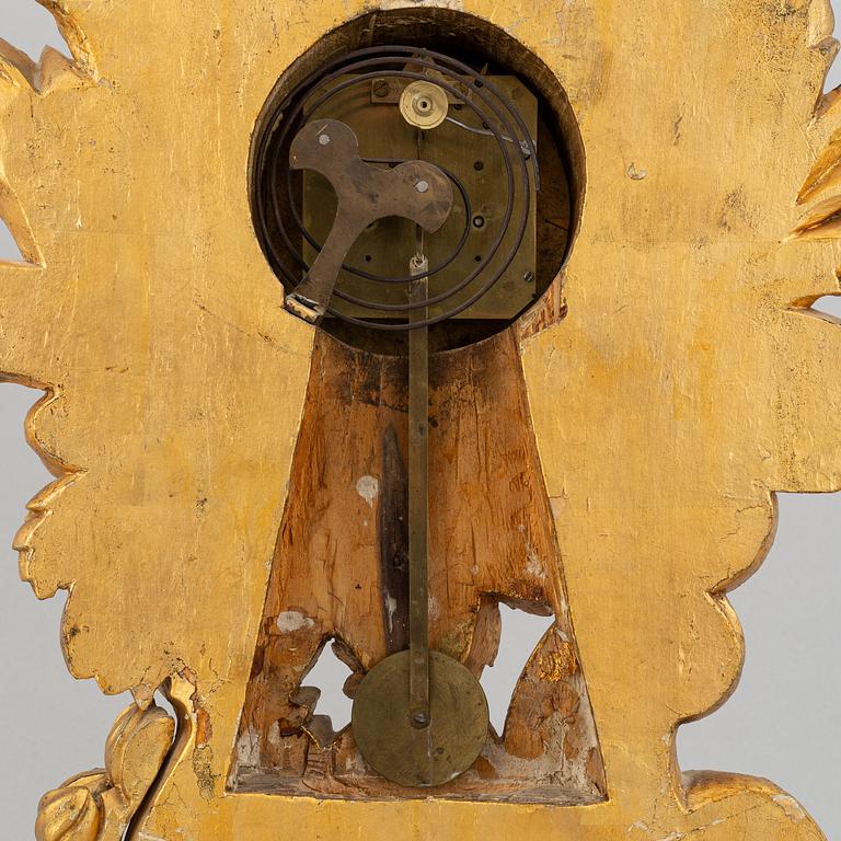 A rococo style table clock, 19th Century.