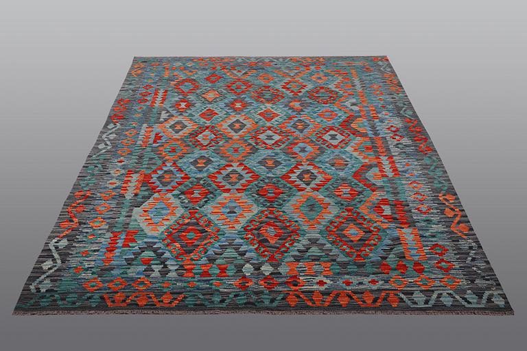 A rug, kilim, ca 252 x 179 cm.