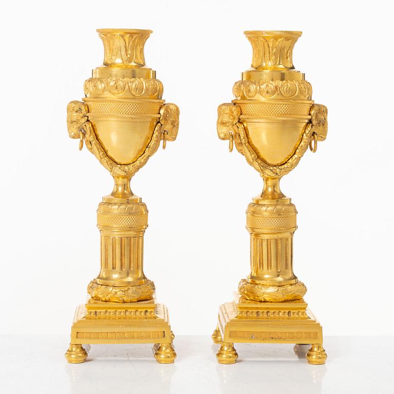 A pair of French Louis XVI style gilt-bronze casolettes, later part 18th century.