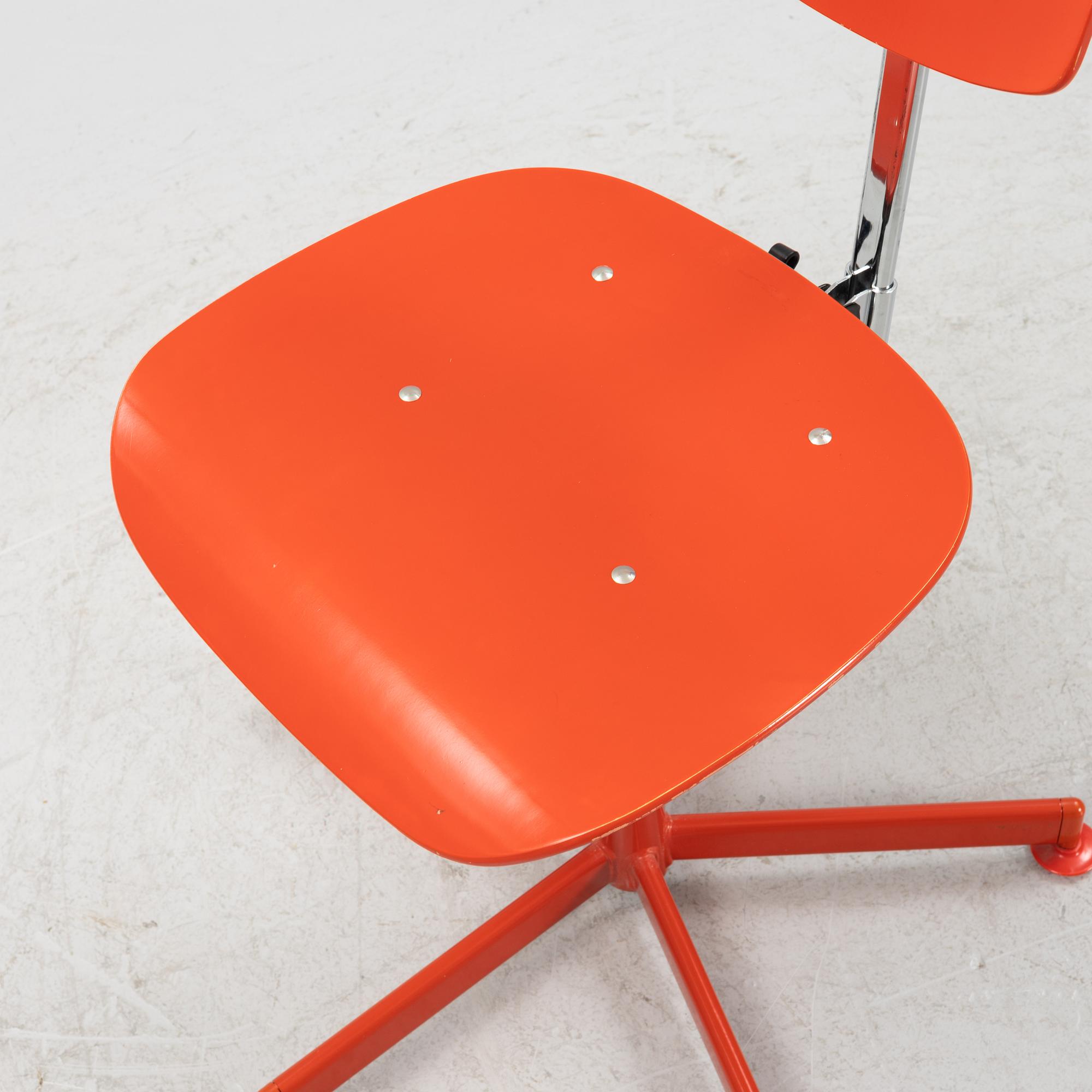 A red desk chair, 1970's.