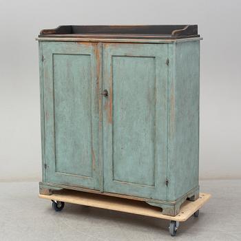 A mid 19th century painted cupboard.