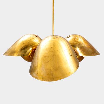 A 1940s Carl-Axel Acking brass ceiling pendant from Bröderna Malmströms.