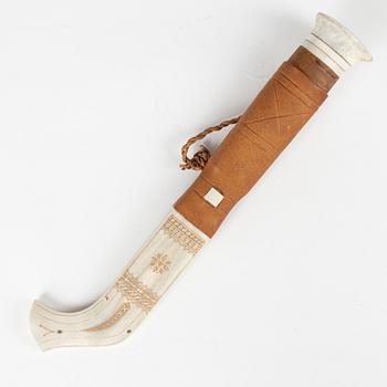 A reindeer horn knife by Nils Per Partapuoli, signed.