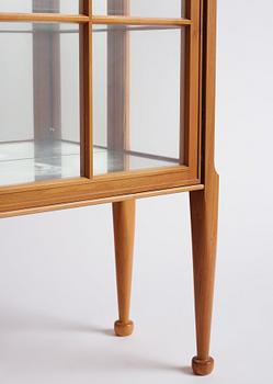 Josef Frank, a walnut showcase cabinet, Svenskt Tenn, Sweden, model B 2217, probably 1950s.
