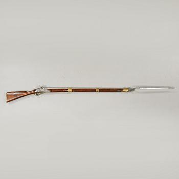 A percussion rifle with bayonet, probably swedish model 1815-45.
