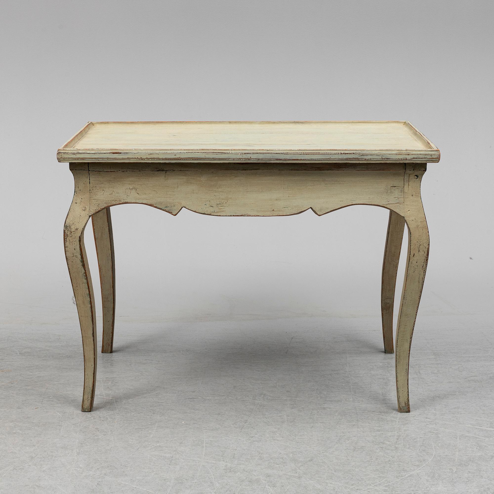 A Rococo table, 18th Century.