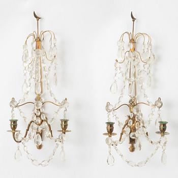 A pair of Gustavian style girandoles, early 20th Century.