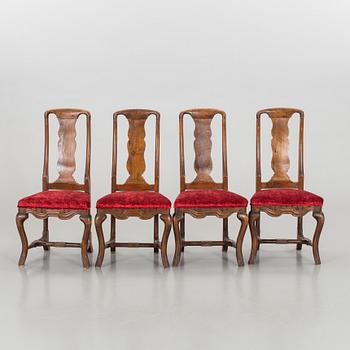 A Lat Baroque-style dining table and 8 chairs, raound 1900.