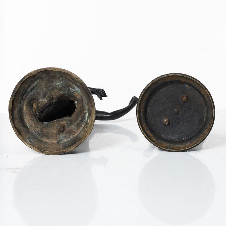 Two bronze sculptures.