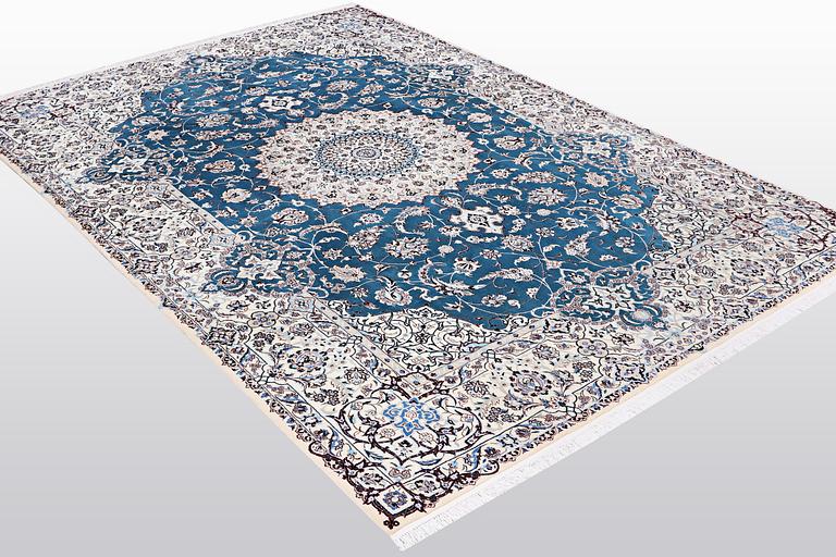 A carpet, Nain, part silk, 6 Laa, ca 312 x 208 cm.