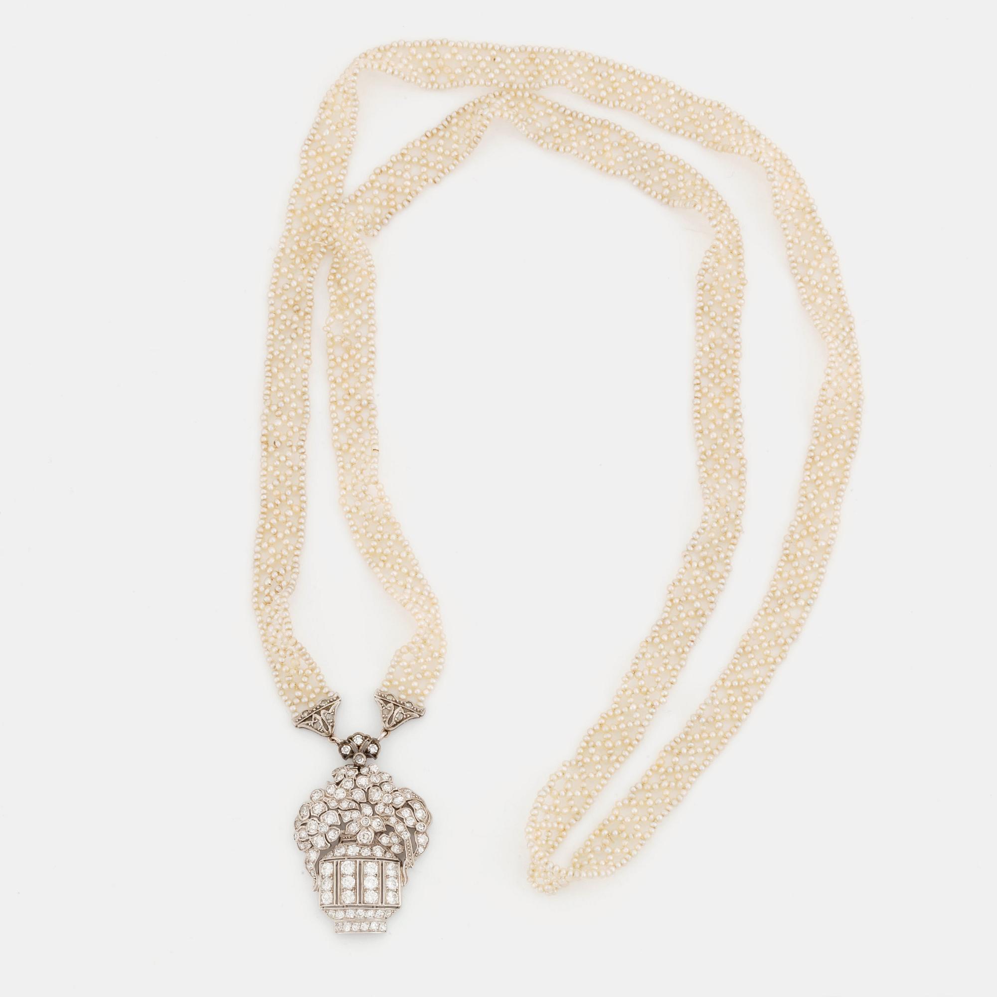 A diamond and pearl sautoir.