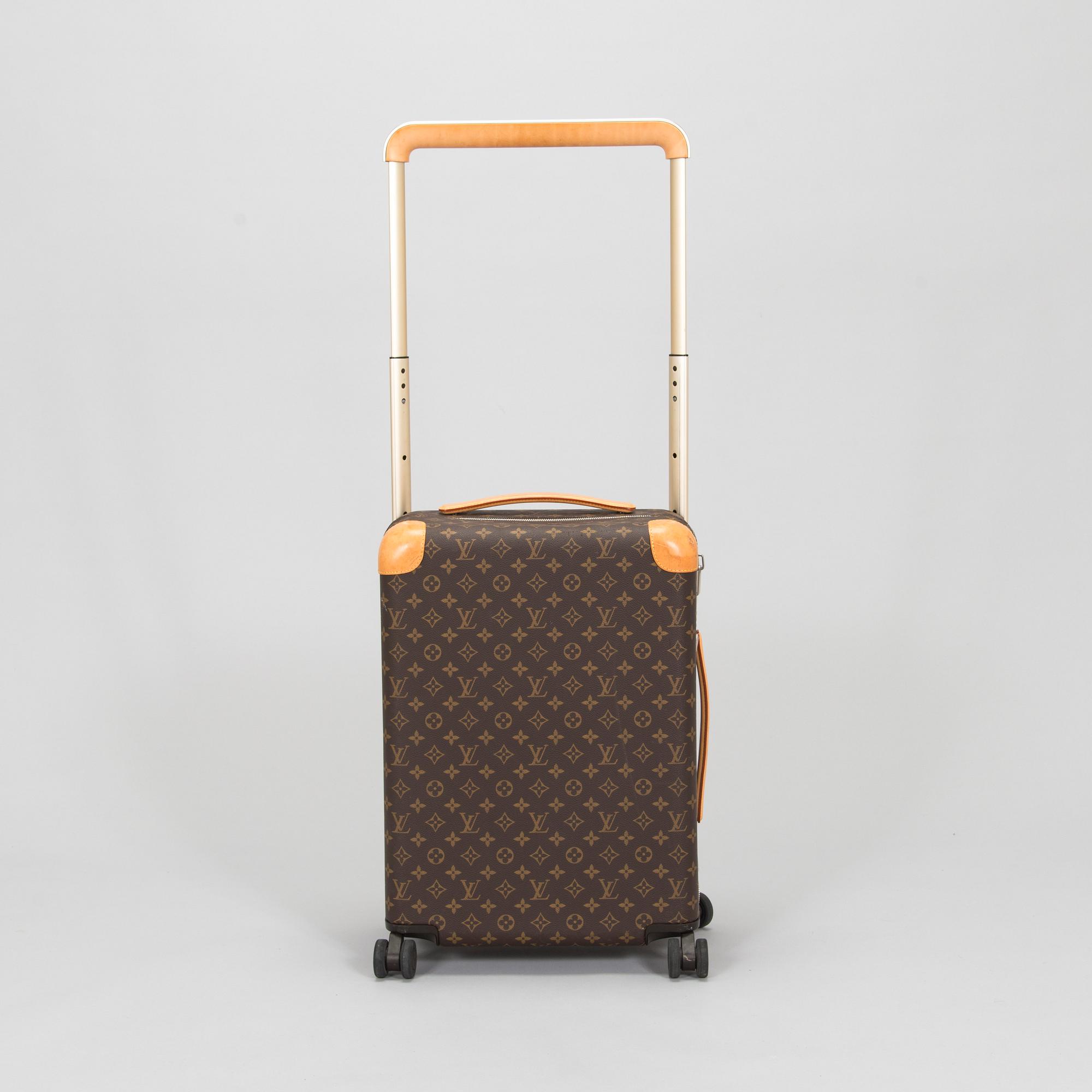 Louis Vuitton,  a 'Horizon 50' carry-on luggage bag.