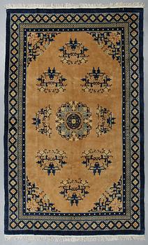 A carpet, semi-antique/Old China, ca 302 x 196 cm.