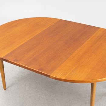 Karl Erik Ekselius, a teak-veneered dining table, JOC, Vetlanda, Sweden, 1960's.