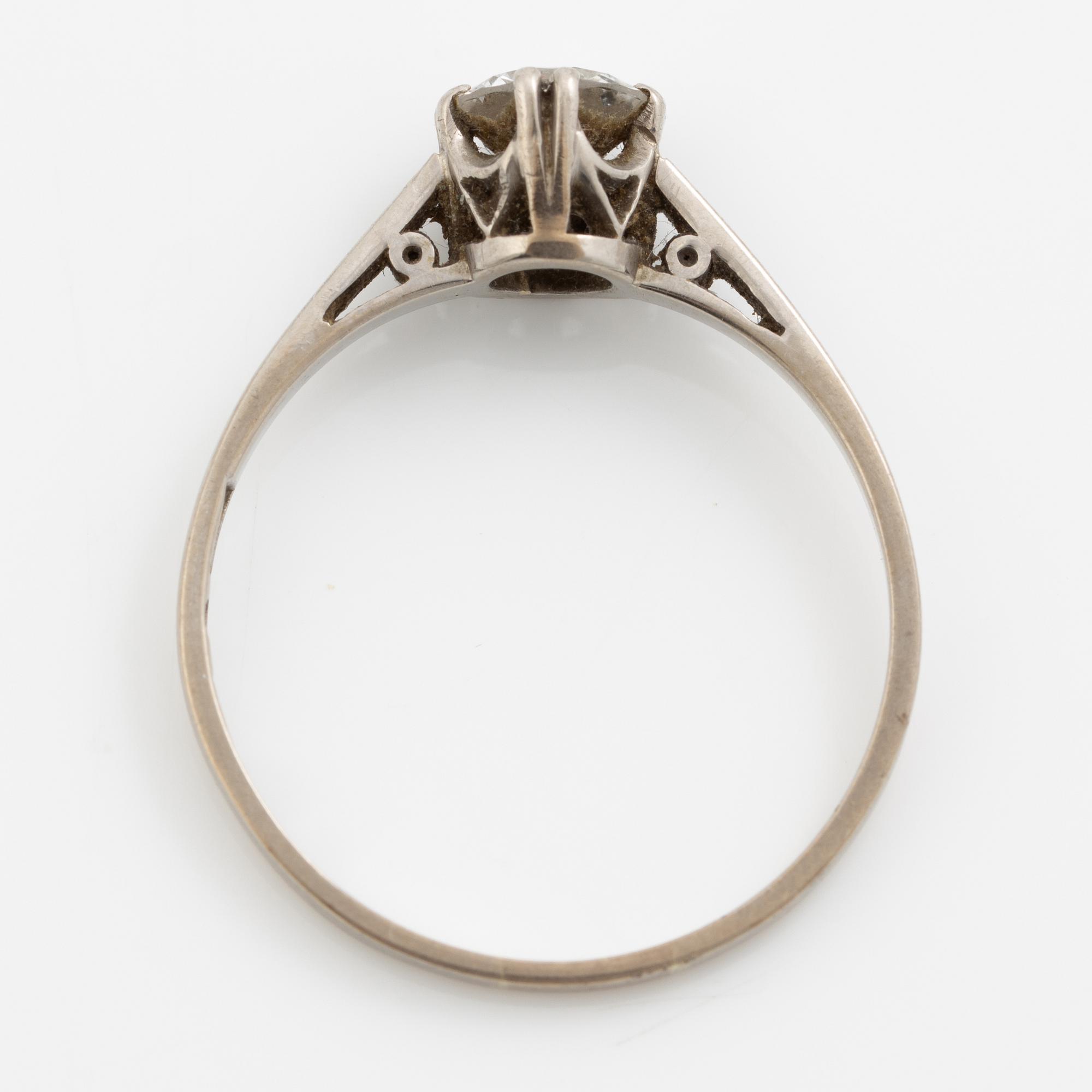 Ring, 18K white gold with brilliant-cut diamond.