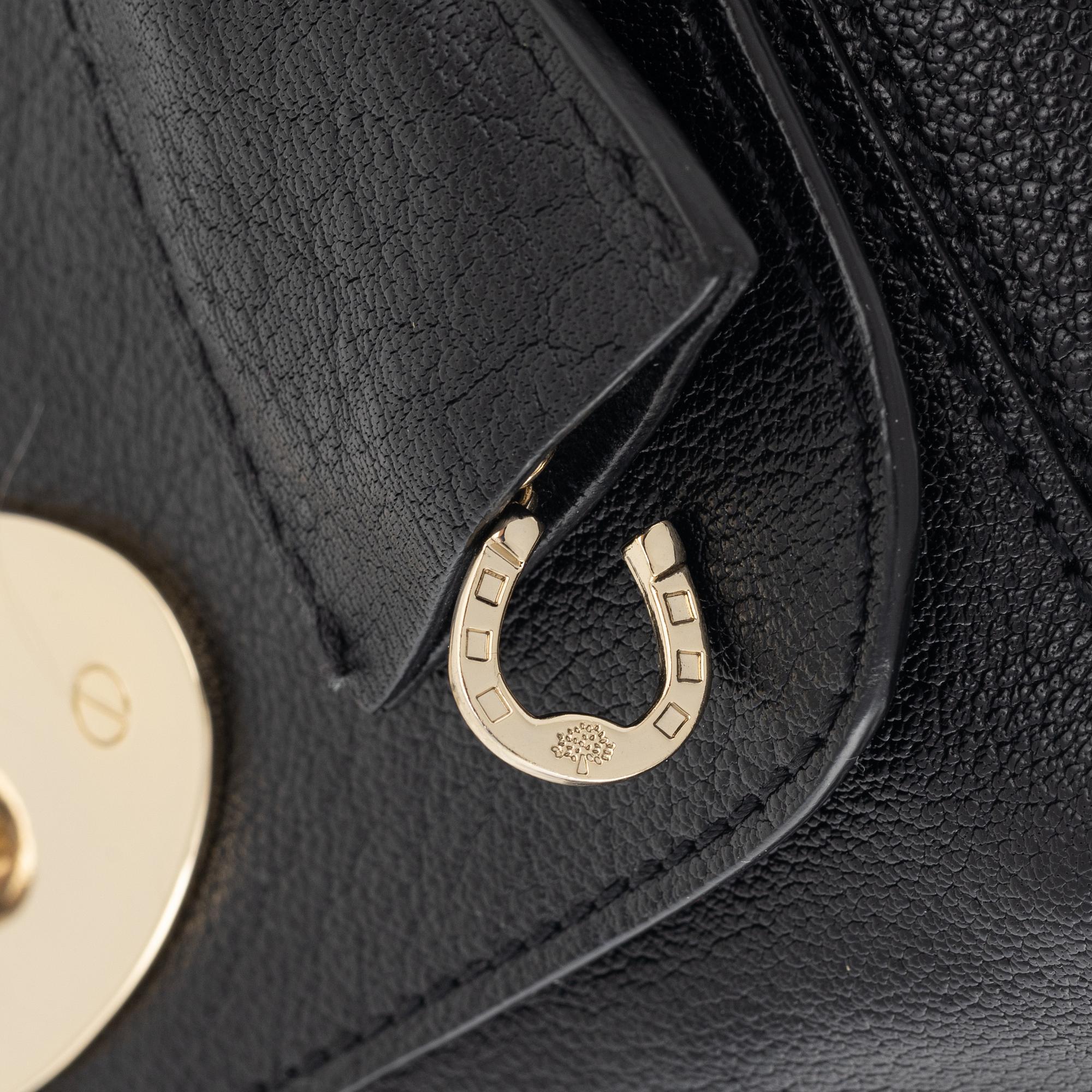 Mulberry, a black leather 'Lily' handbag.