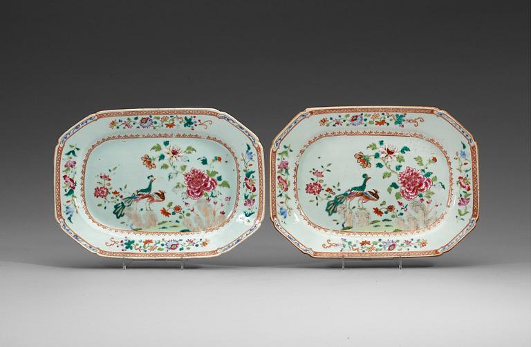 A pair of famille rose 'double peacock' serving dishes, Qing dynasty, Qianlong (1736-95).