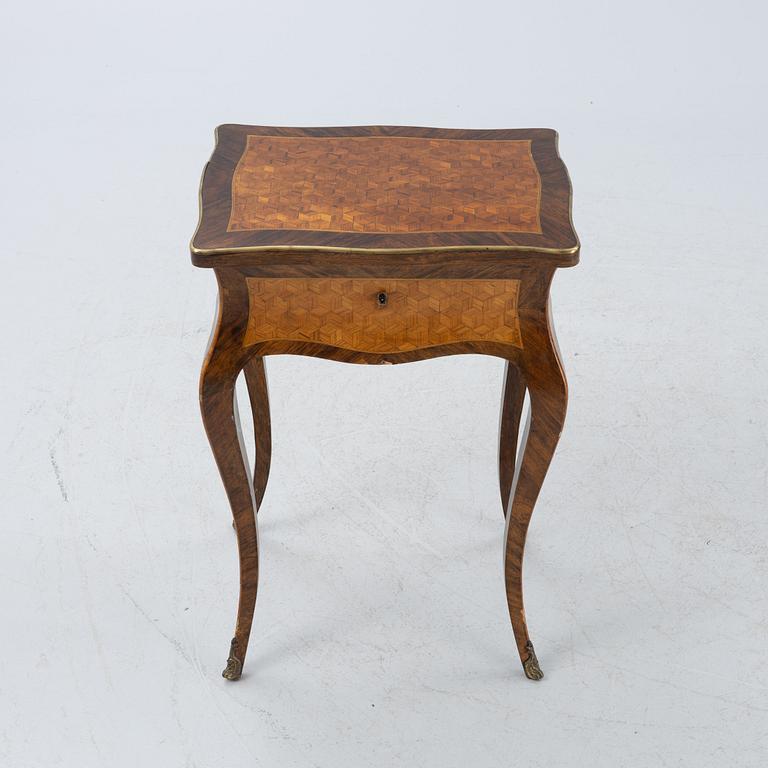 A Louis XV-style sewing table, 19th century.