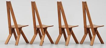 A set of four elm dinning chairs by Pierre Chapo, France 1960's.