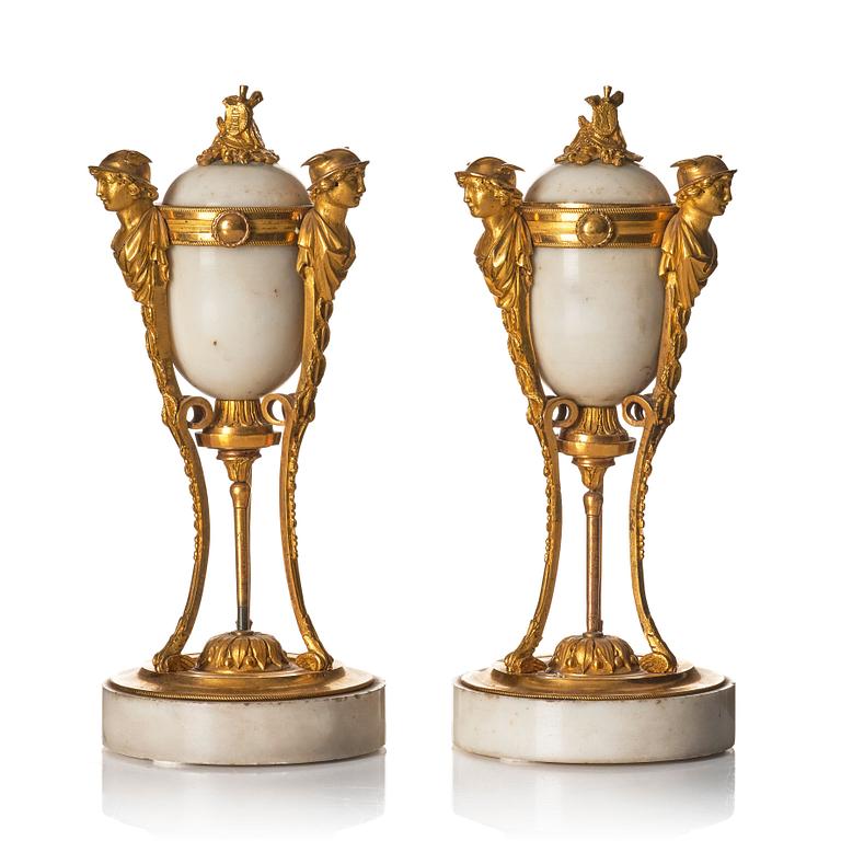 A pair of Louis XVI Cassolettes, white marble and gilt-bronze, around 1790.