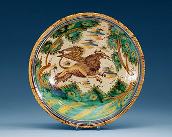 1318. An Italian faience charger, 17th Century.