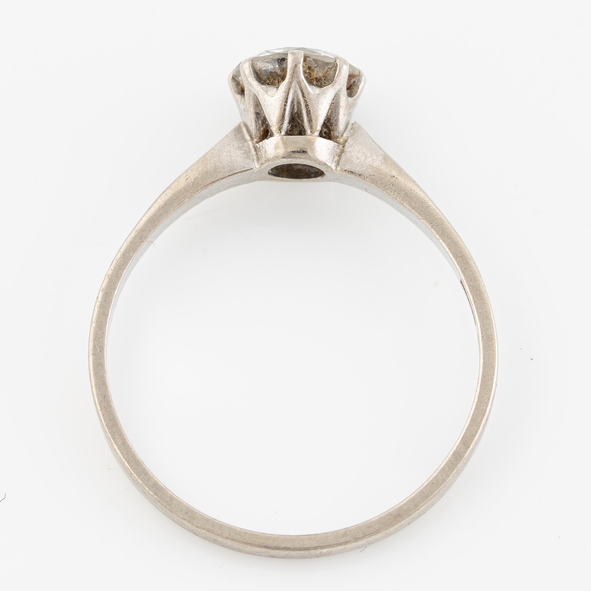 Ring, 18K white gold with brilliant-cut diamond.