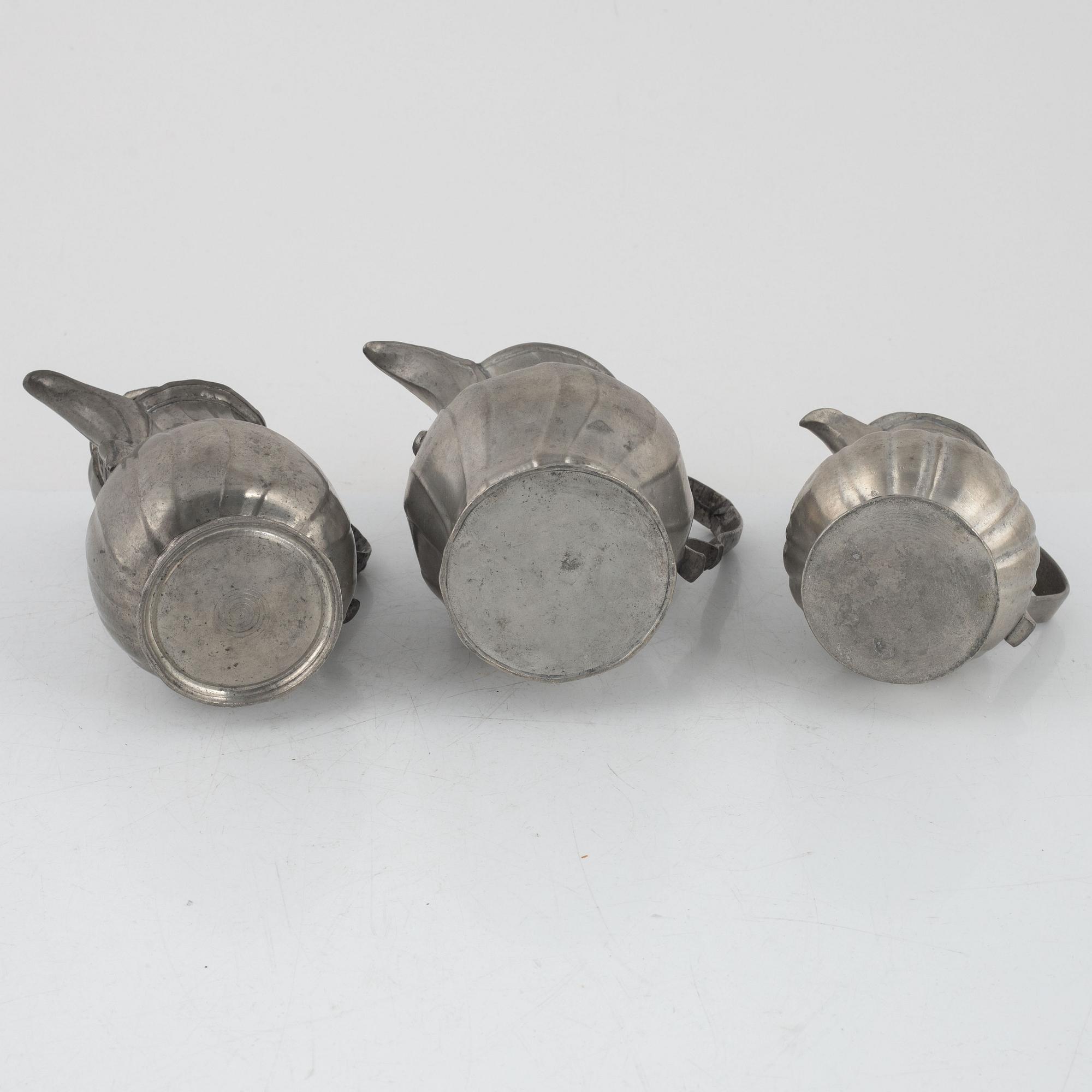 Three Rococo pewter coffee pots, 18th century.