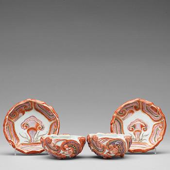 658. A pair of famille rose bowls with stands, Qing dynasty, Qianlong (1736-95).