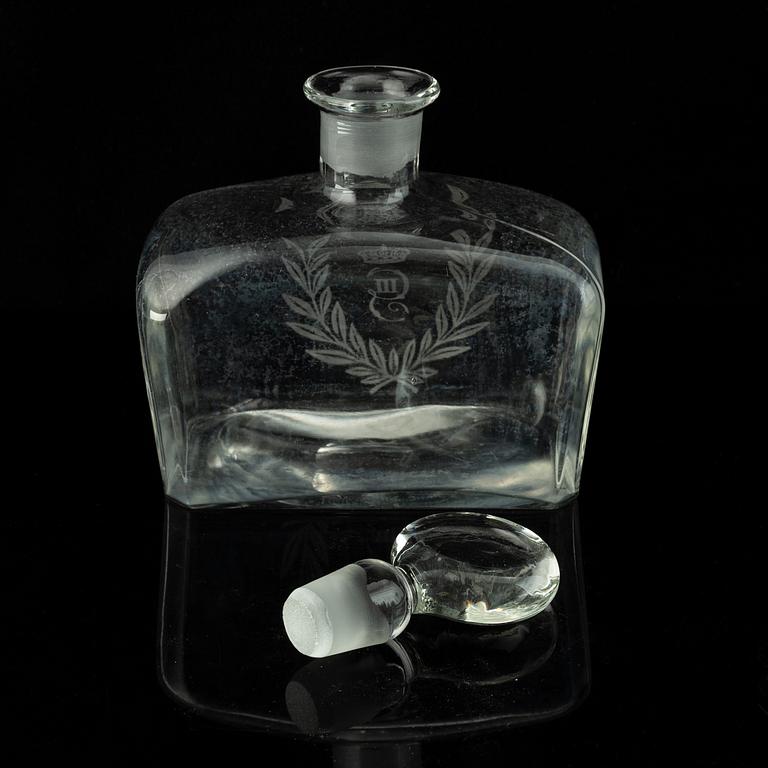 A set of 11 wine glasses and a bottle with stopper, 1900-tal.