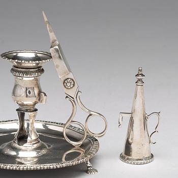 An English pair of 18th century silver chamber candlesticks, mark probobly of Ebenezer Coker, London 1770.