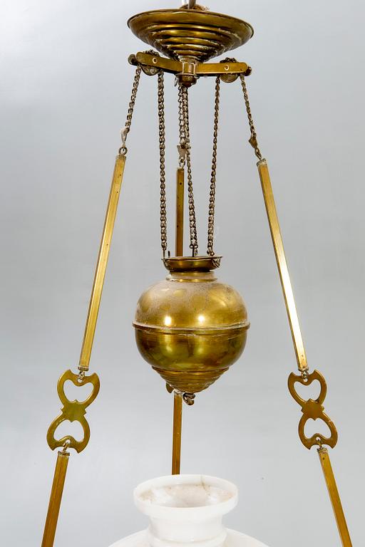 A Jugend brass celing paraffin lamp.
