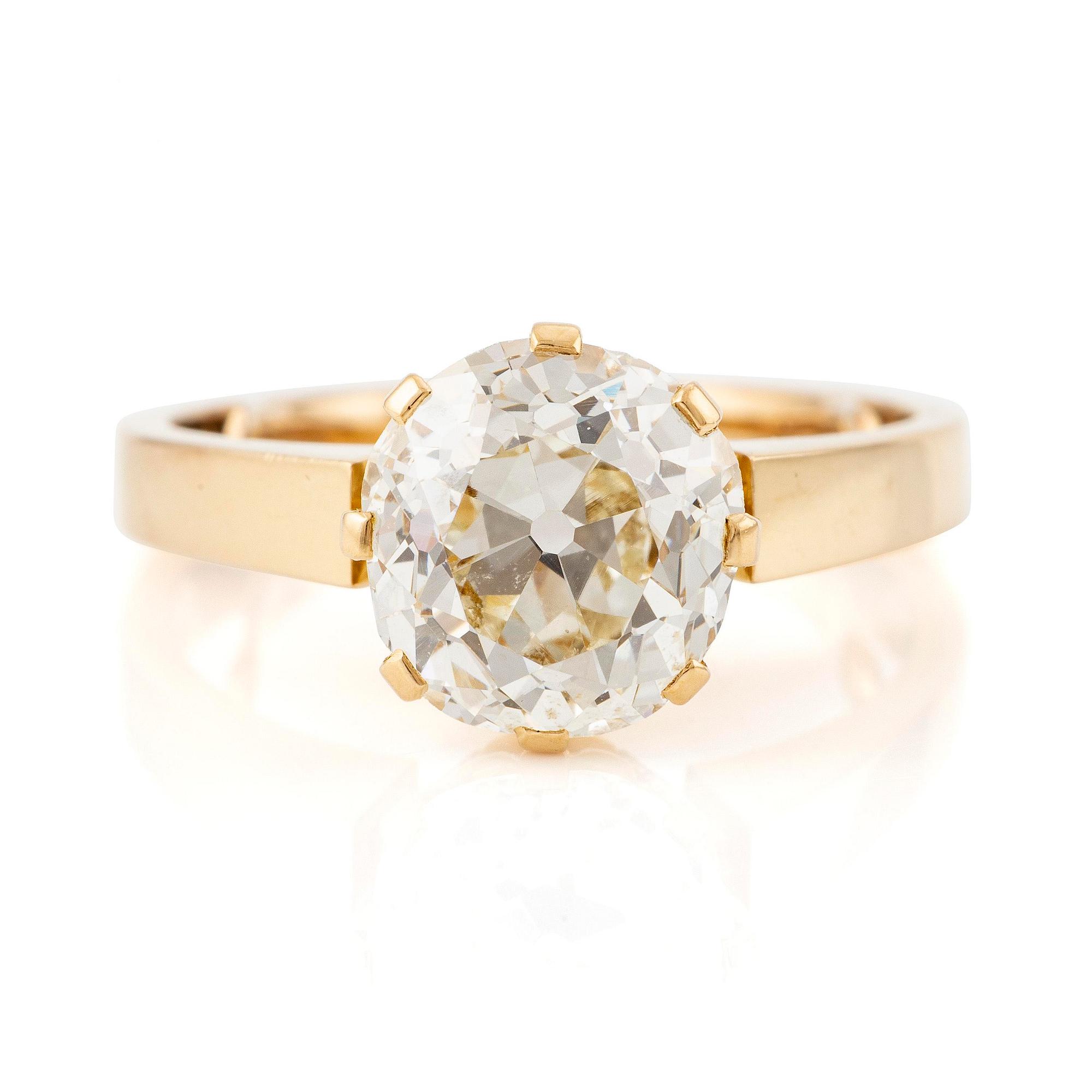 Ring 18K guld med en gammalslipad diamant.
