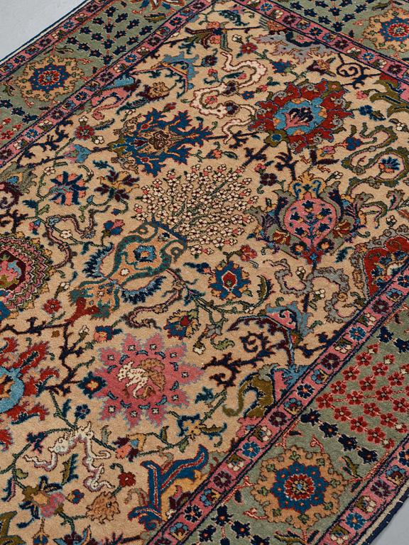 MATTO, a semi-antique Tabriz, ca 198 x 142 cm.