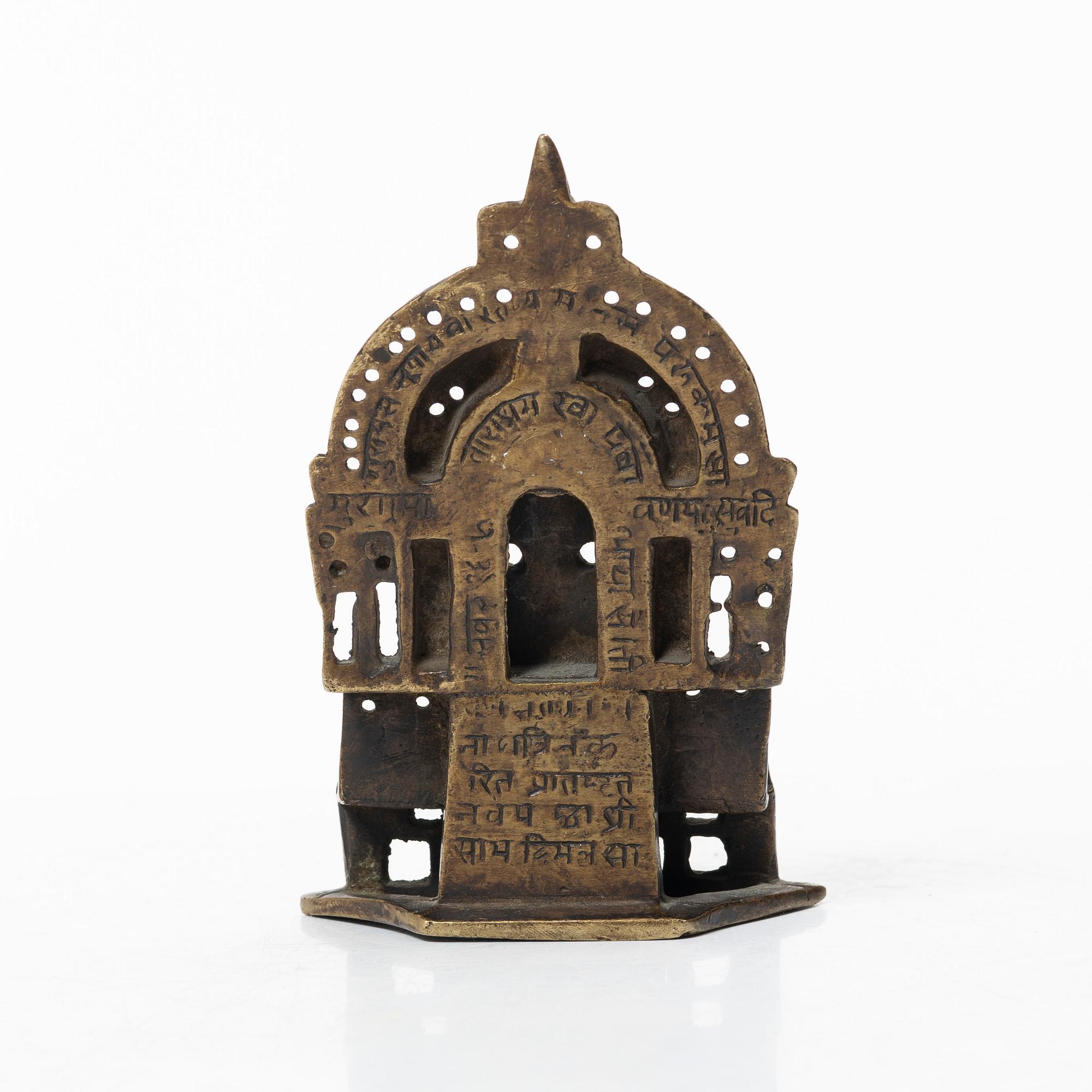 A Jain copper alloy shrine, India, 14th-17th century.