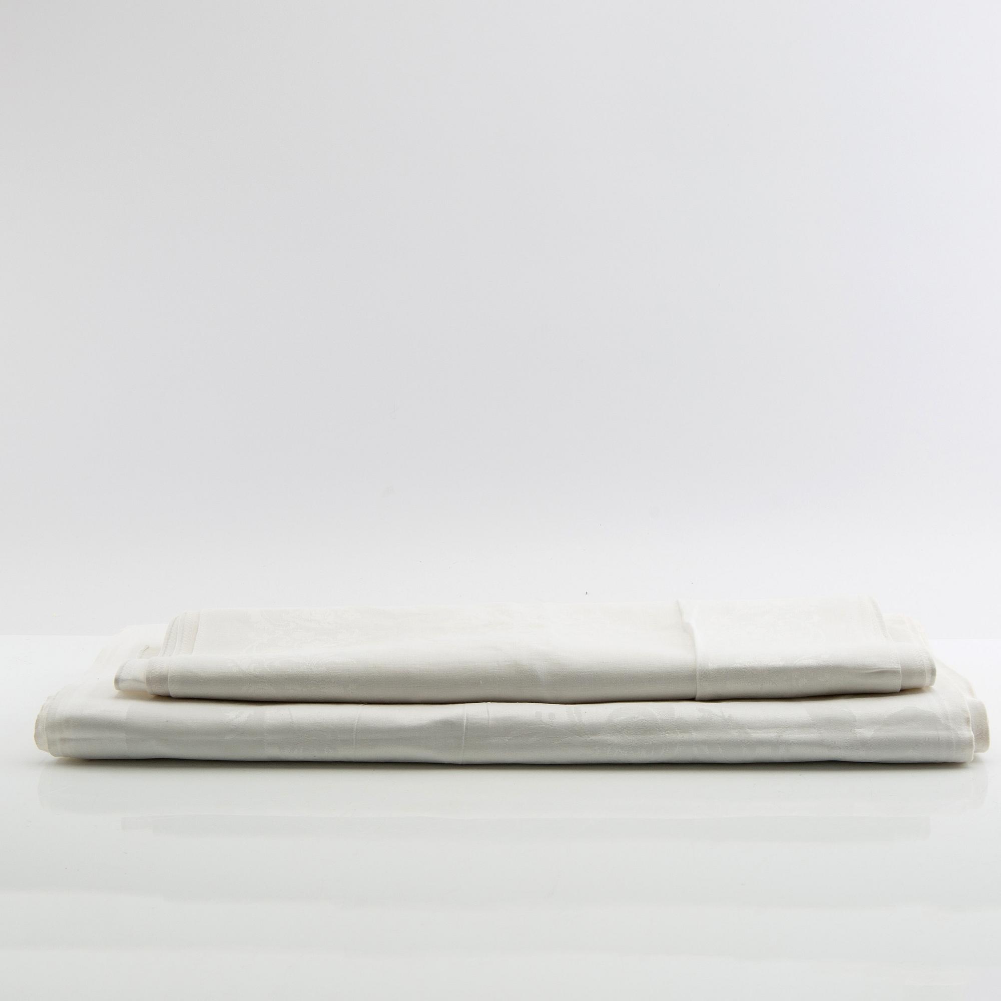 Tablecloth and napkins, 11 pcs, damask, first half/mid 20th century.